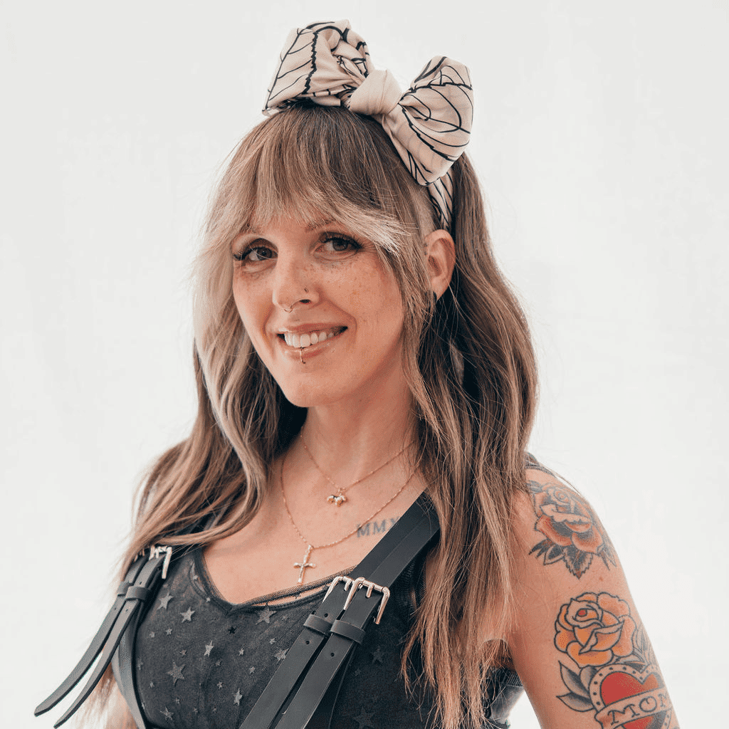 Portrait of Khalee, a professional stylist at Sweet Peach, showcasing their expertise and style.