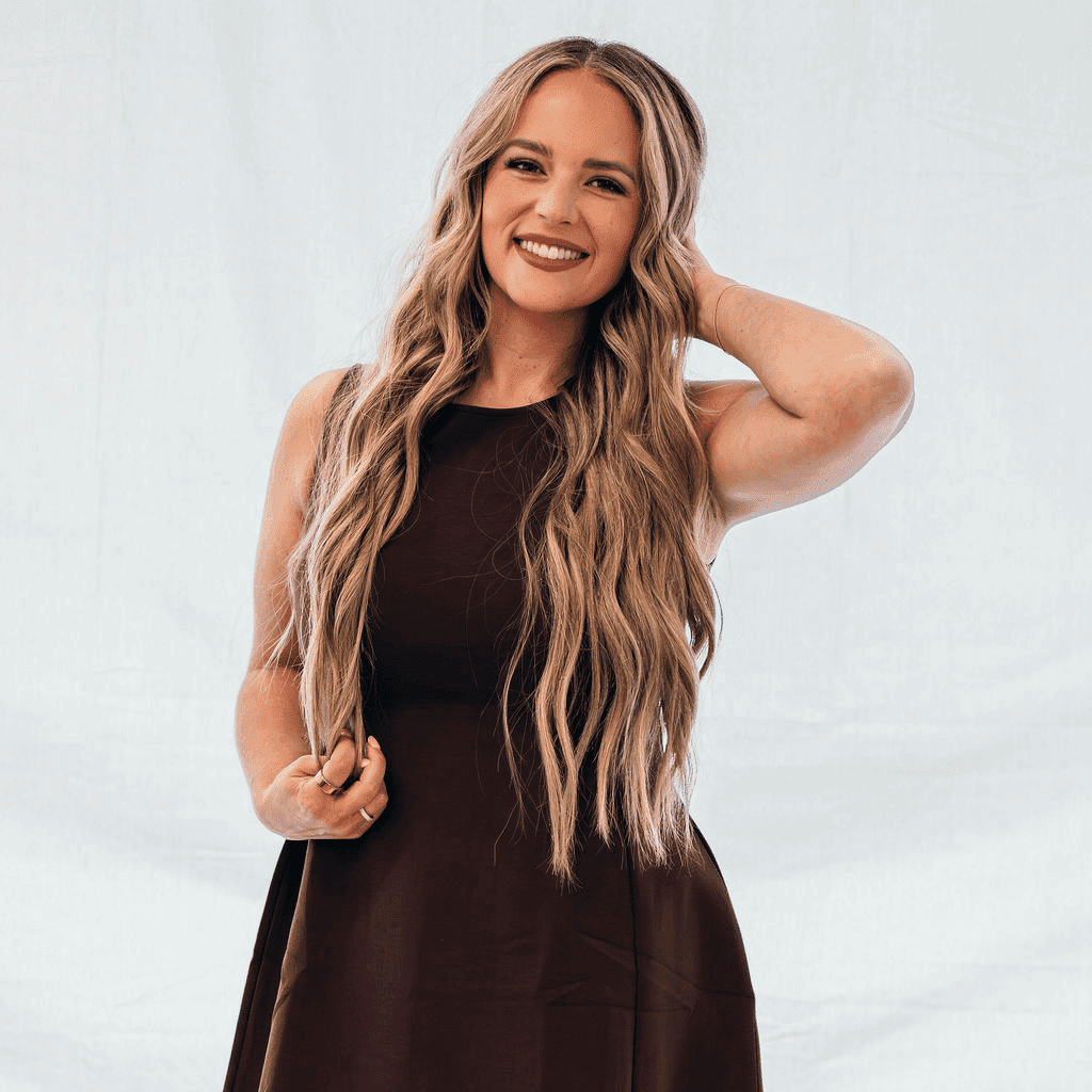 Portrait of Alyssa, a professional stylist at Sweet Peach, showcasing their expertise and style.