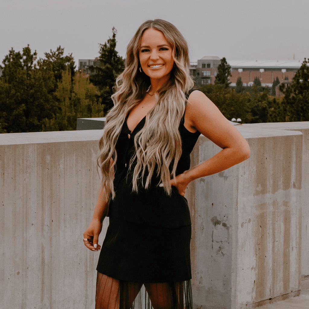 Portrait of Alyssa, a professional stylist at Sweet Peach, showcasing their expertise and style.