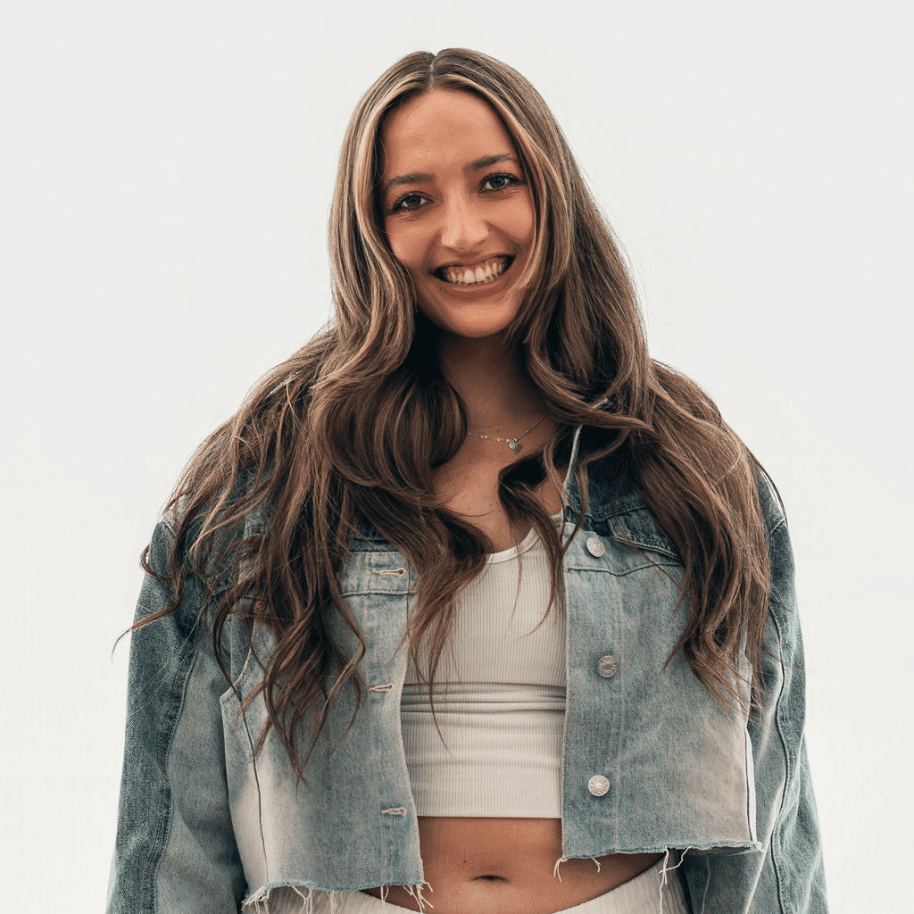 Portrait of Marisa, a professional stylist at Sweet Peach, showcasing their expertise and style.