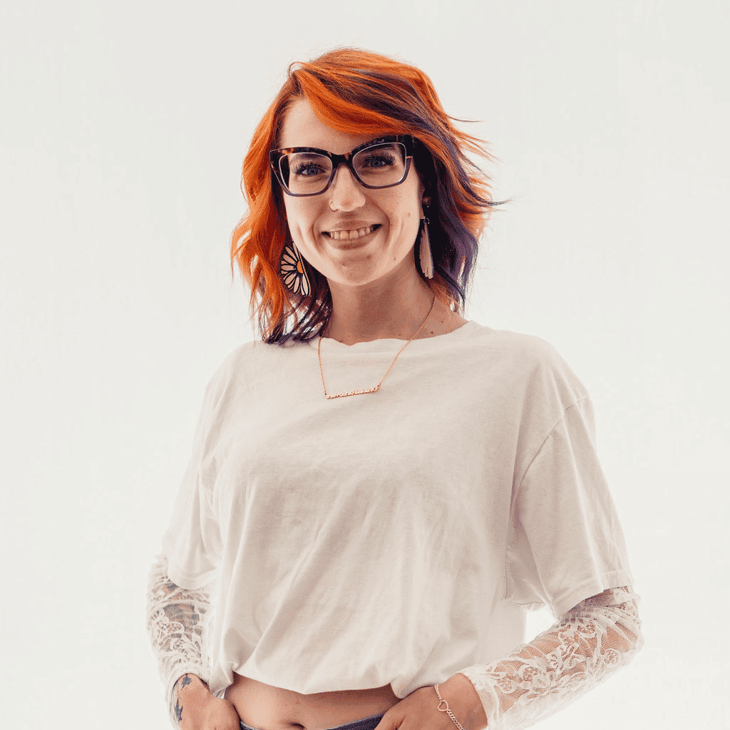 Portrait of Kelby, a professional stylist at Sweet Peach, showcasing their expertise and style.