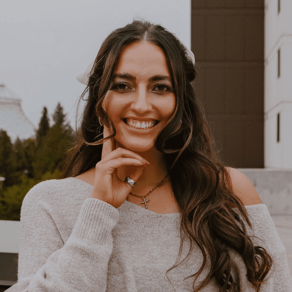 Portrait of Marisa, a professional stylist at Sweet Peach, showcasing their expertise and style.