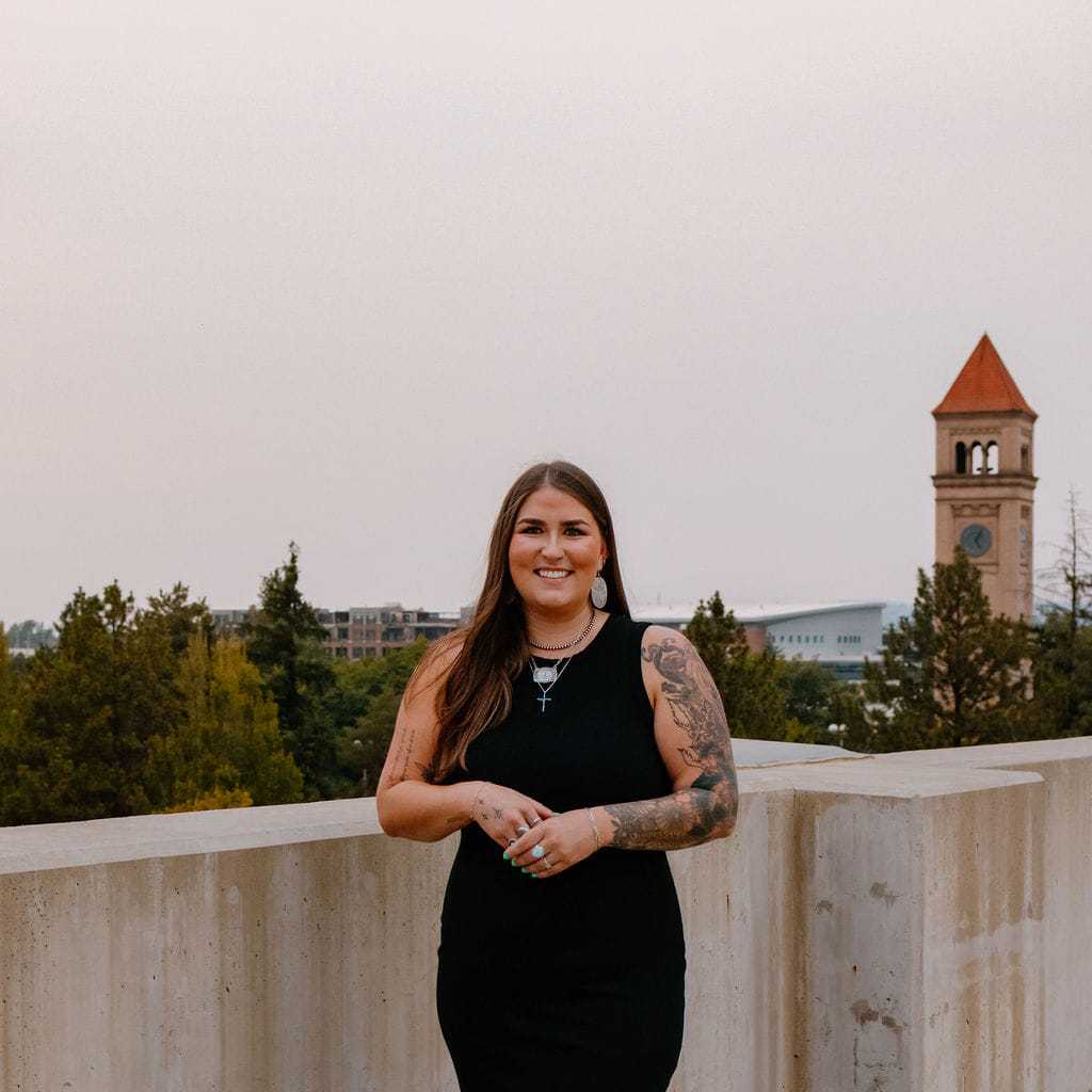 Portrait of Sara, a professional stylist at Sweet Peach, showcasing their expertise and style.